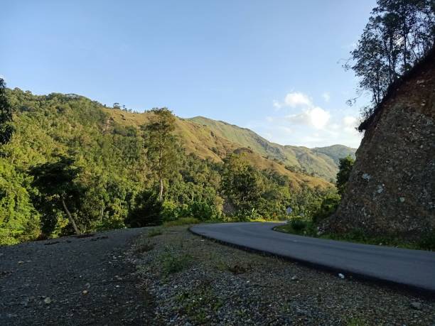 istock Road Leading To A Hill 1471415596