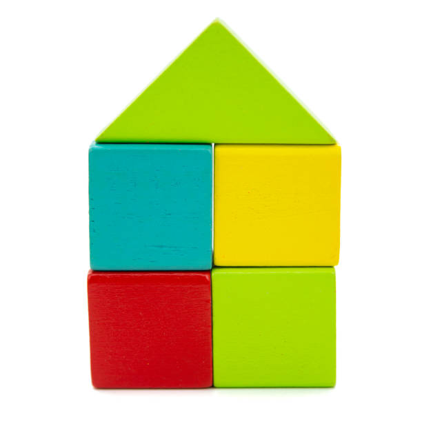 istock Wooden multicolor construction house cubes bricks isolated on the white background 1471416161