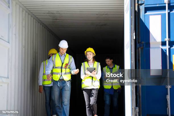 Worker Work At Container Warehouse Stock Photo - Download Image Now - Solar Energy, 20-24 Years, 25-29 Years
