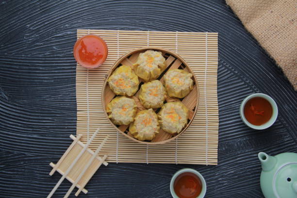 istock Top View Dimsum Siomay on Black Background 1471420651