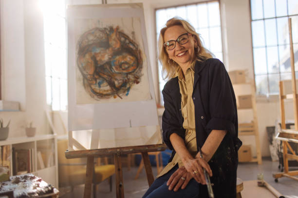istock Smiling woman artist 1471420818