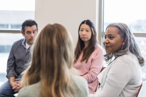 istock Tense moment among diverse members of support group 1471421294