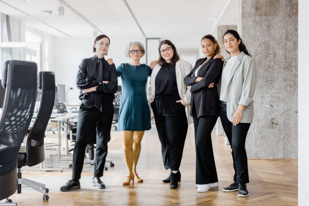 istock Confident business professionals standing together in office 1471421671