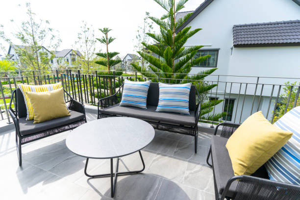 istock Modern outdoor sofas and table and comfortable pillow on a private porch. 1471421998