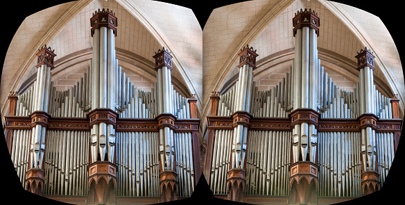 A view of the musical instrument which is the trumpet against the background of the sheet music
