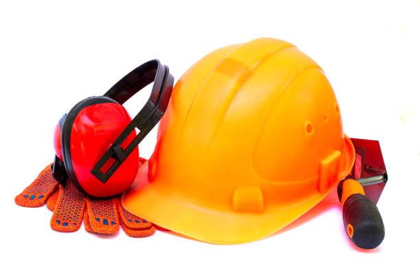 istock Orange helmet for the builder as a means of protection at a construction site on a white background. 1471426360