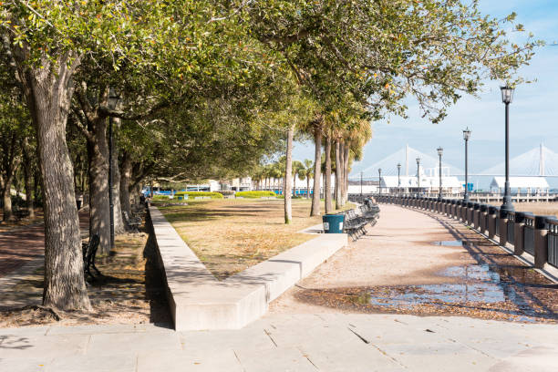 Pathway in Riverfront Park, Charleston, South Carolina, with bridge in background. stock photo