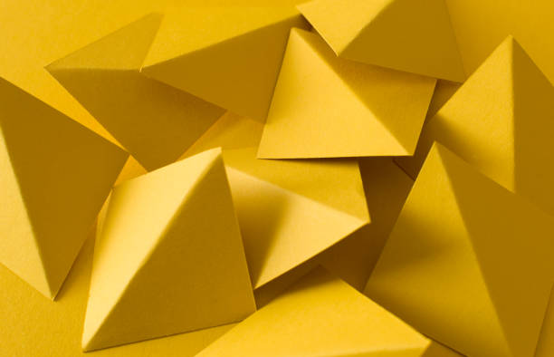 istock Geometric yellow 3d background with triangle shapes 1471427659