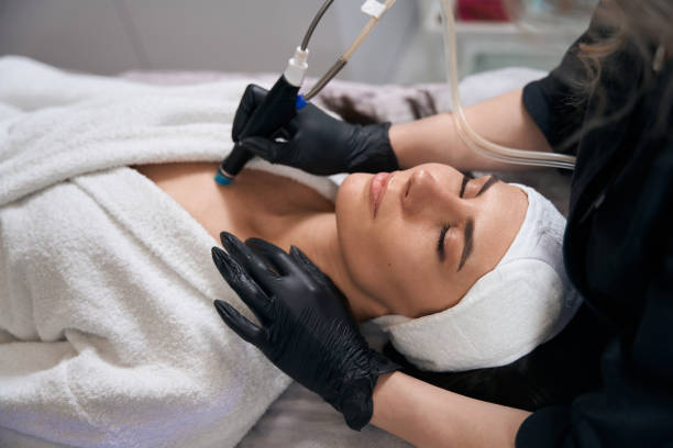 istock Medic doing skin rejuvenation, working in salon 1471428572