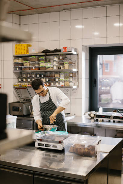 istock The chef prepares food in the modern spacious kitchen. 1471430434