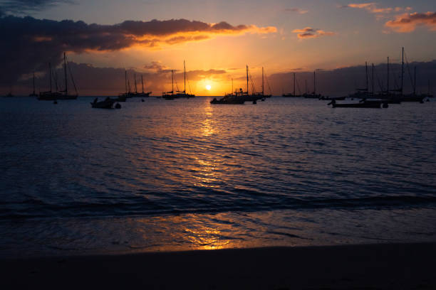 istock Sunset lights and boats shapes 1471430637