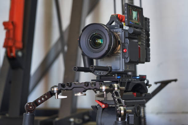 istock a professional lens is mounted on a video camera with the screen and attachments turned on 1471430751