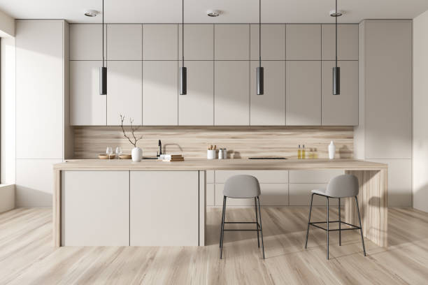 istock Light kitchen interior with bar countertop and chairs, cooking area 1471431664