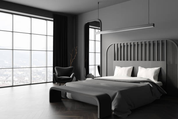 istock Grey bedroom interior with bed and armchair near panoramic window 1471431726