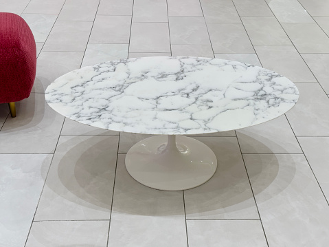 Marble coffee table on tiled floor