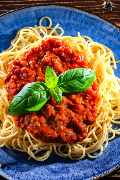 istock Composition with a plate of spaghetti bolognese 1471434971