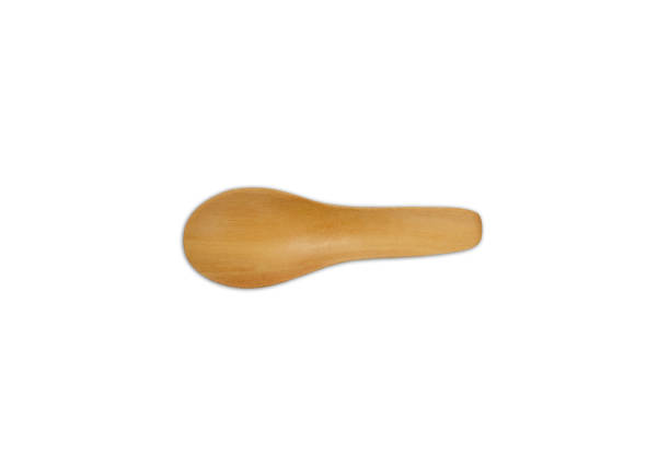 istock Wooden spoon on white background 1471435388