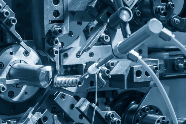 istock Close up scene the coil spring machine in light blue. 1471435582