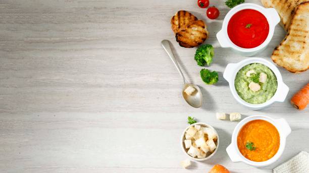 istock Tomato, Broccoli, and Carrot Soup, Top View 1471436628