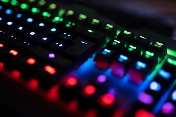 istock A RGB keyboard with gaming streaming setup glowing in the dark 1471439886