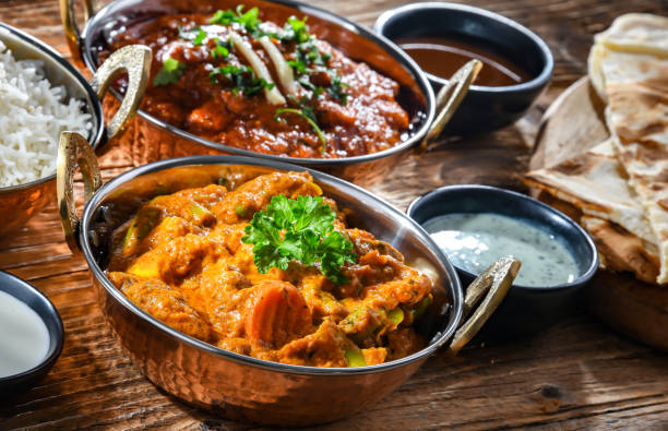 istock Hot madras paneer and vegetable masala with rice 1471439930