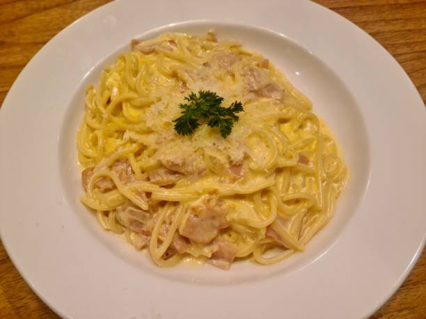 istock a plate of Spaghetti carbonara with sausage 1471444875