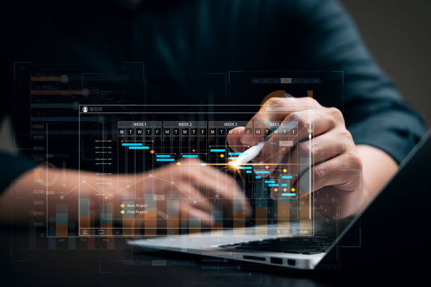 istock businessman analyzing business Enterprise data management, business analytics with charts, metrics and KPIs to improve organizational performance, marketing, financial organization strategy. 1471445012
