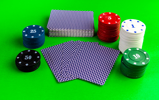 Poker game. Poker cards and chips on the table.