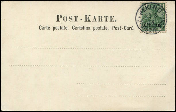 istock a vintage blank postcard sent from German post office in Peking, China in 1900s,  ready for any usage of  historic events background related to mail delievery description. 1471445527