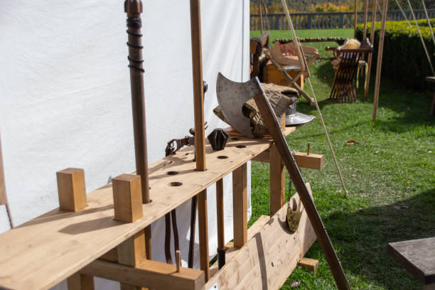istock Medieval weapons depot with axe and spear 1471450504