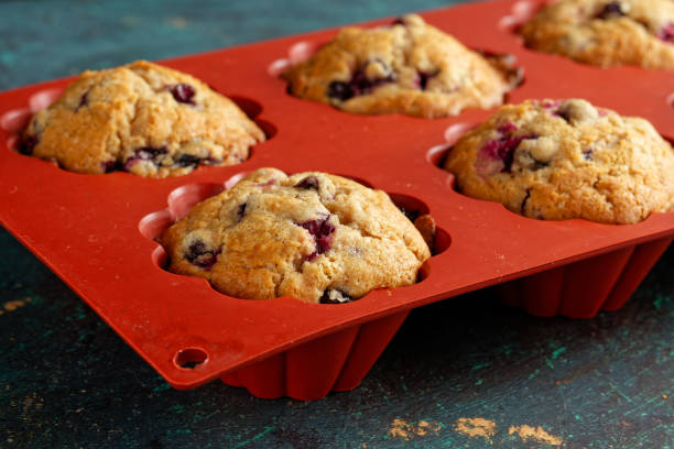 Homemade blueberry muffins in red silicone baking dish