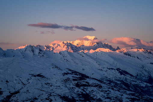 Sunset at Mont Blanc, the highest peak in Europe seen from La Plagne ski resort in France. Beautiful colors of sunset