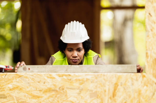 istock Black Woman Architect Checking At Construction Site 1471457803
