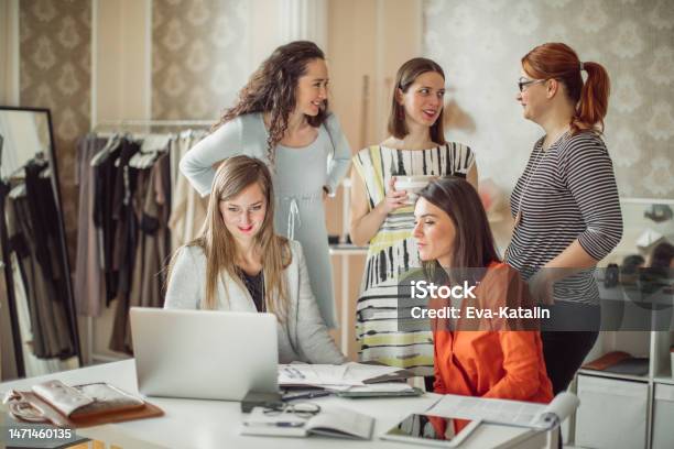 Colleagues Working Together Stock Photo - Download Image Now - 30-39 Years, Adult, Adults Only
