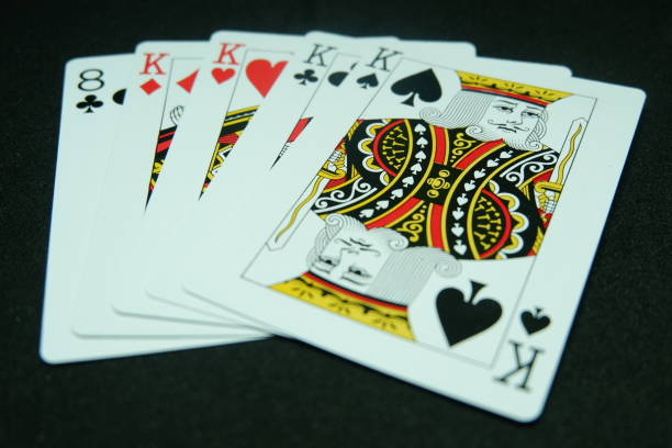 4種類のカード(同じ値の4枚のカード、たとえばキングの4枚と8枚) - nine of spades ストックフォトと画像