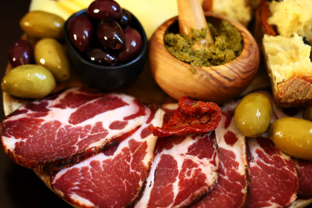 istock Italian board. Cheese, ham, olives, Italian bread. 1471466451