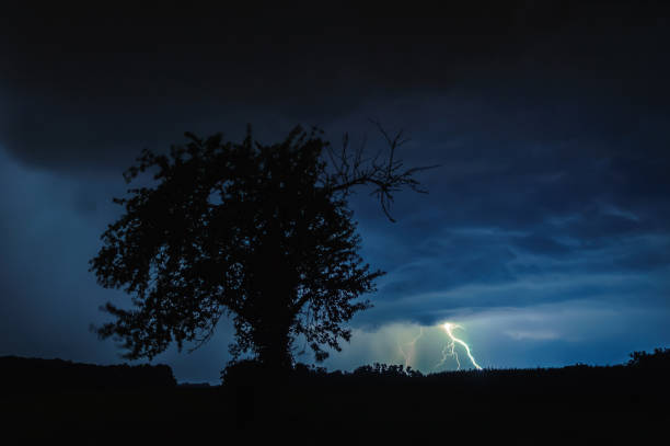 Lightning during a thunderstorm in a village.