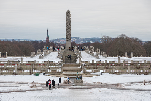 Norway, Oslo - 17 February 2019: View of the monolith in Frogner Park, sculpture created by Gustav Vigeland. Public park in capital city of Norway.