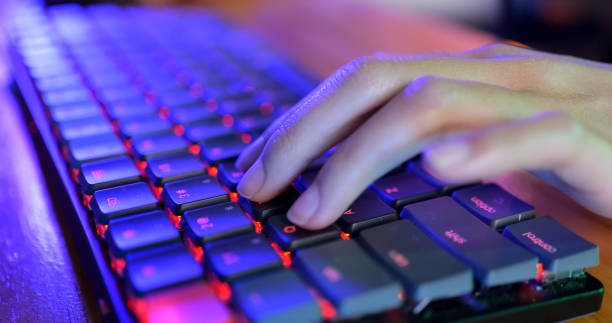 istock Close up shot of person typing on computer keyboard 1471470738