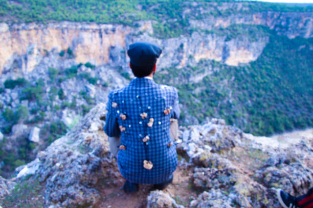 an artistic and regionally dressed poet in nature