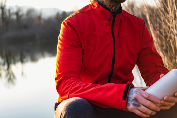 Close up on a red sportive jacket for hiking.