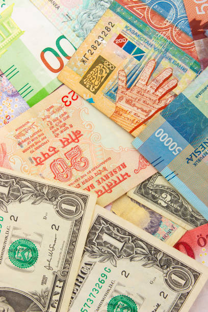 istock Background from different money banknotes from all over the world 1471474712