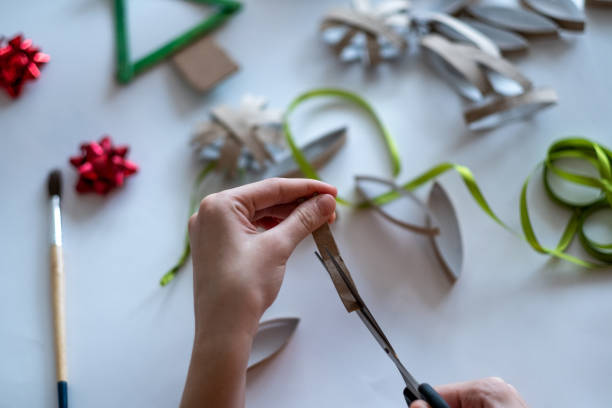istock close up of children's hands making decorations for the Christmas tree 1471477515