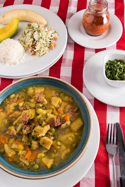 istock Restaurant table with pork tripe soup with rice and vegetables 1471479874