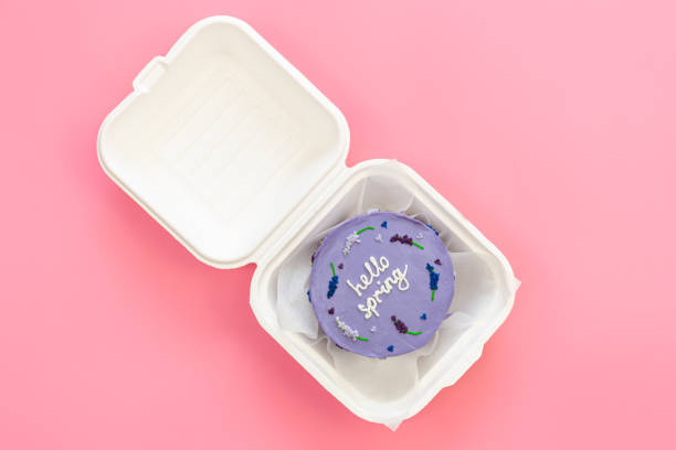 istock Delicious bento cake Hello spring on a pink background, flat lay. 1471480634