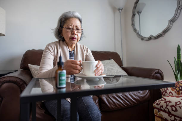 istock Senior Woman Using Cannabis CBD 1471480874