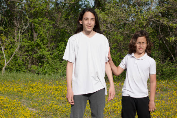 istock Two brothers playing in the garden 1471482708
