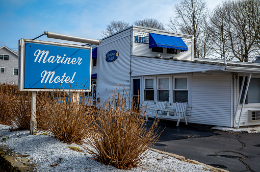 A view of a classic seaside motel in Falmouth, MA on Cape Cod in New England.  This view was taken on a winter afternoon in March before the tourist start arriving.