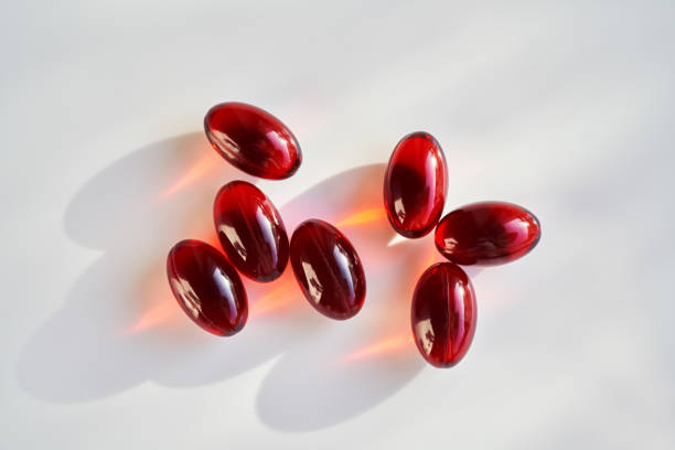 istock Red krill oil capsules on a bright background 1471484234