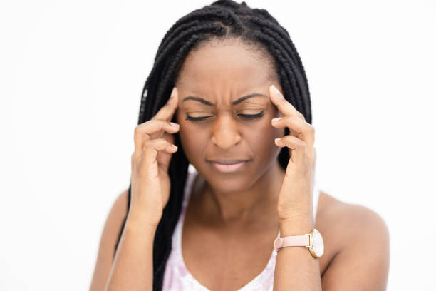 istock Black Woman With a Headache 1471484543